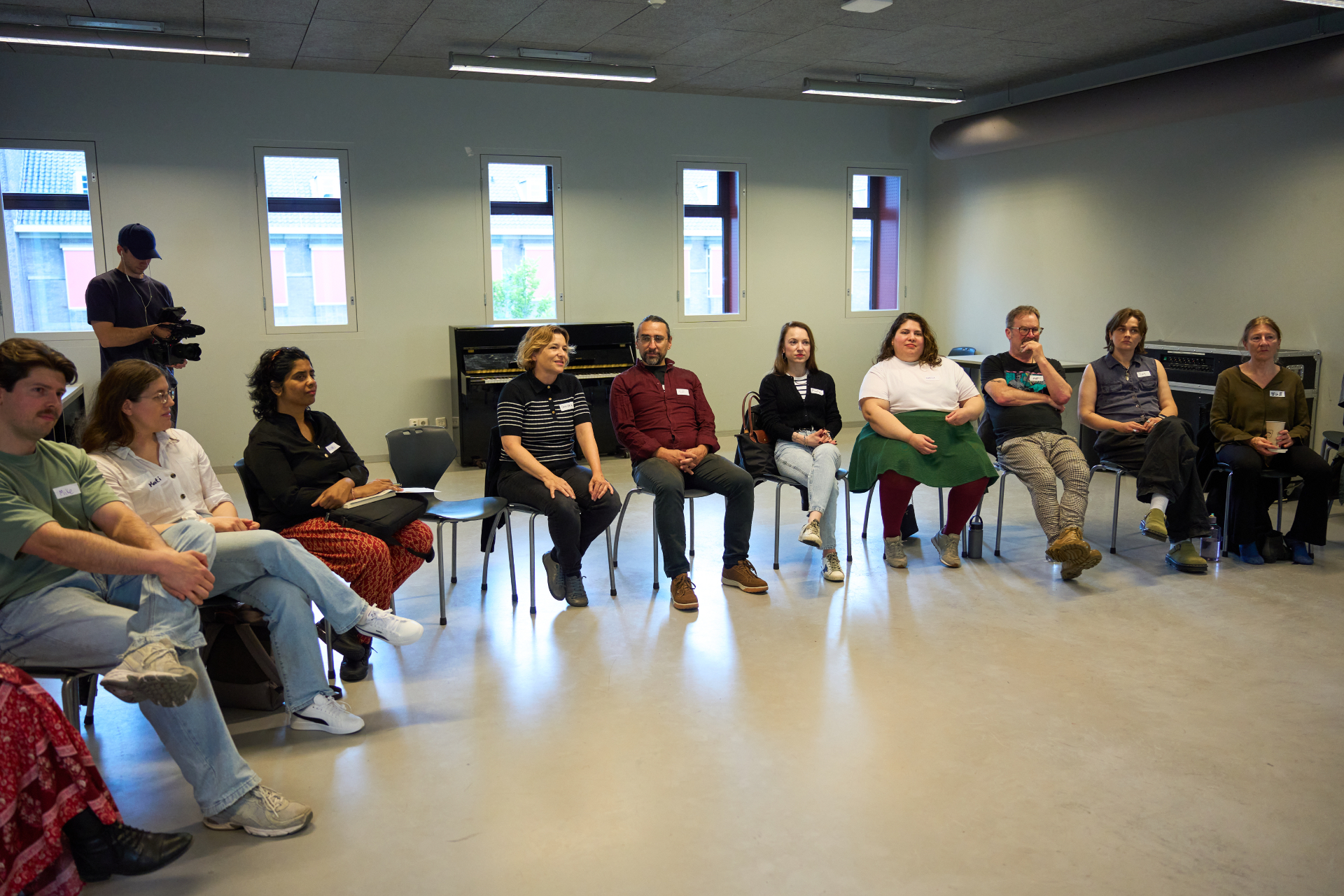 A Monnarc Foundation cohort seated together at CREA Amsterdam.